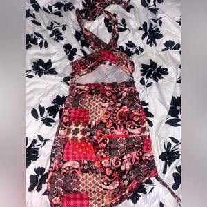 Short patterned shein dress.